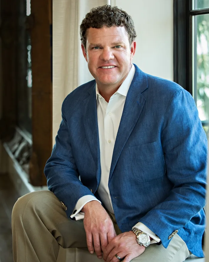 Dr. L. Scott Ennis seated in the Boca Raton practice